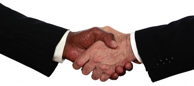 business_men_shaking_hands-e1296983232419.jpg